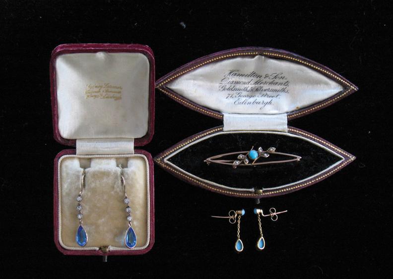 Appraisal: AN EDWARDIAN BAR BROOCH AND EARRING SET the open navette-shaped