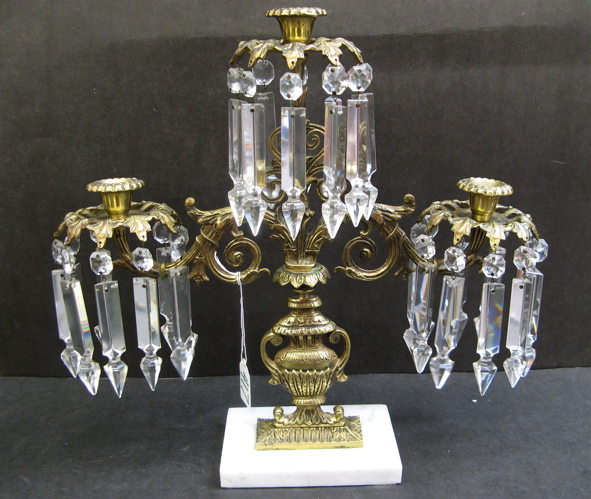 Appraisal: A GILT METAL AND CUT CRYSTAL LUSTRE CANDLEHOLDER the vase-shaped