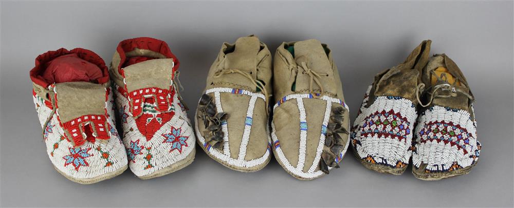 Appraisal: THREE PAIRS NATIVE AMERICAN BEADED ON HIDE MOCCASINS ONE PAIR