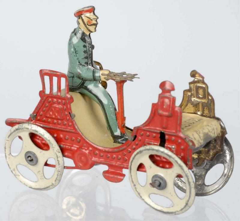 Appraisal: Tin Litho Automobile Penny Toy German Marked Gesch on front