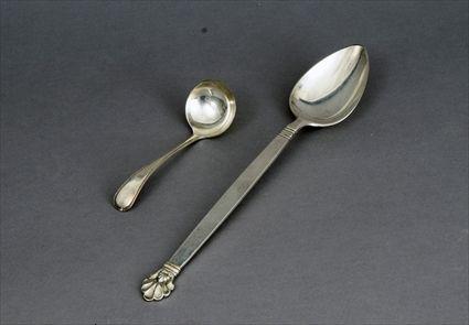 Appraisal: Georg Jensen-Style Sterling Silver Serving Spoon Together with a silverplate