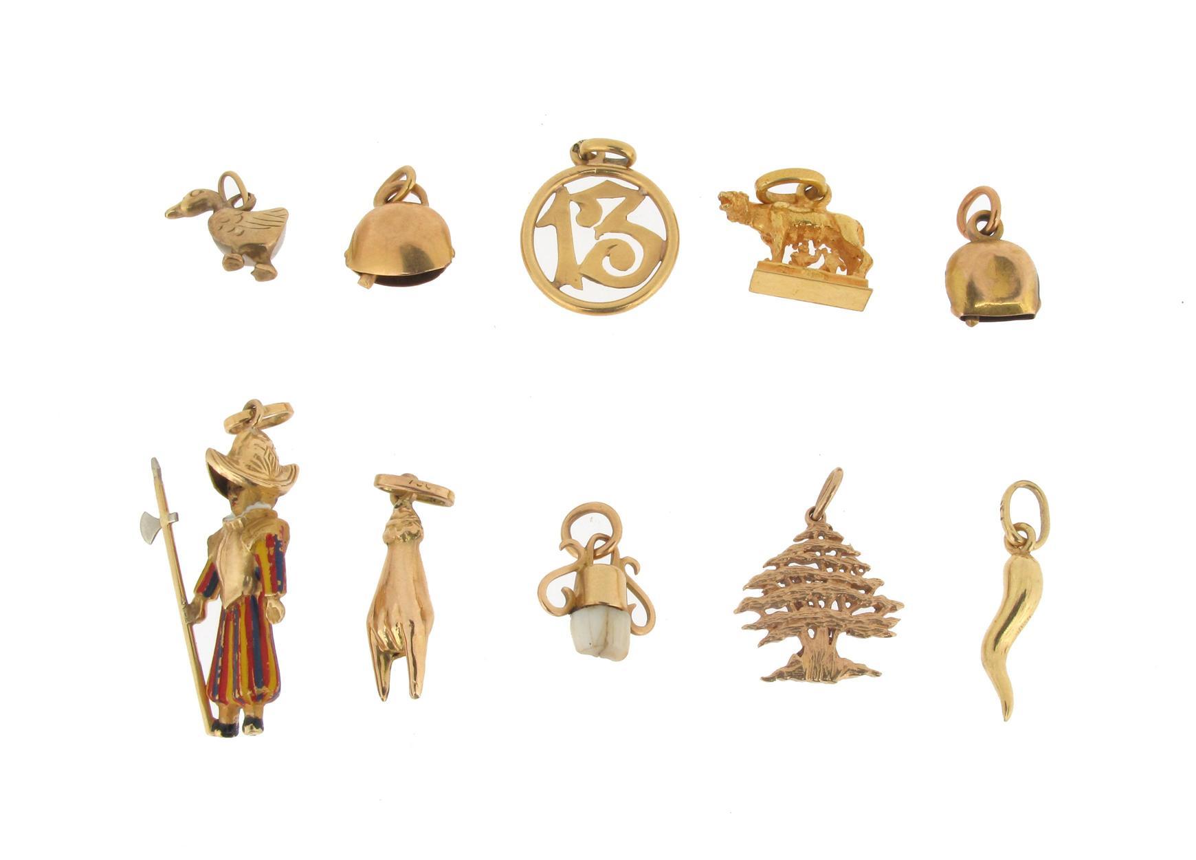 Appraisal: Ten assorted gold and gold mounted charms