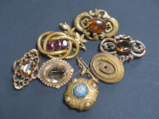 Appraisal: A COLLECTION OF VICTORIAN BROOCHES including a turquoise and seed