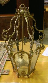 Appraisal: A pair of cast brass hexagonal French rococo lanterns