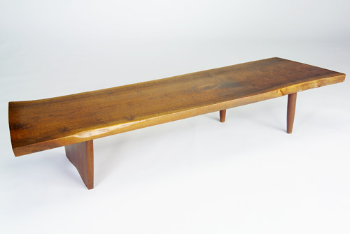 Appraisal: GEORGE NAKASHIMA Fine walnut coffee table with free-edge top and