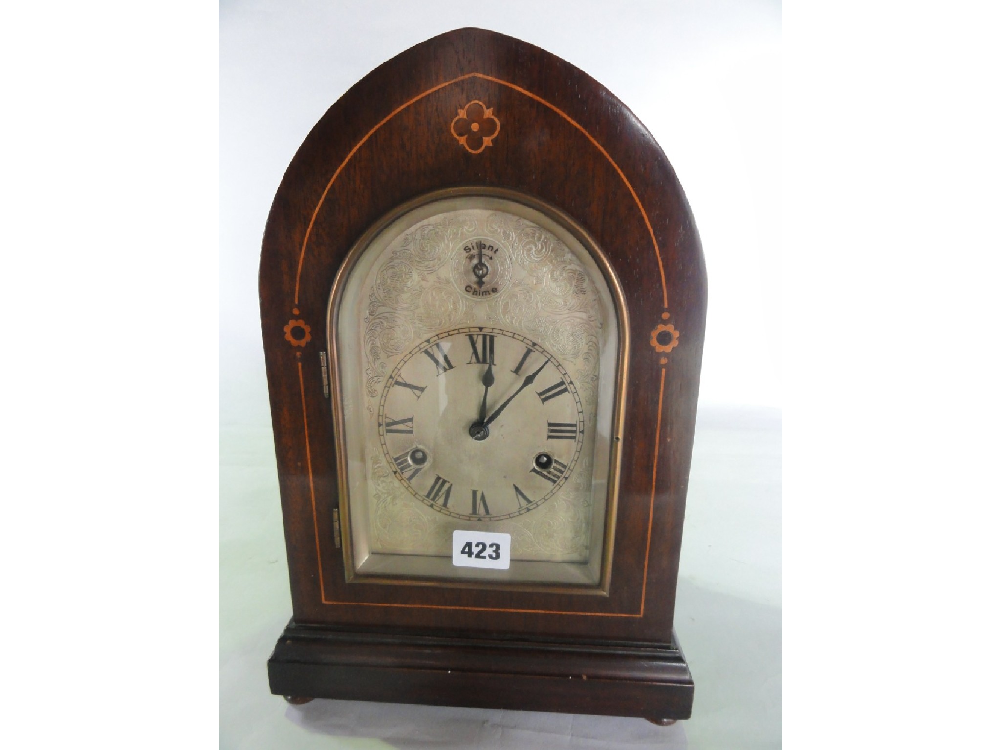 Appraisal: An Edwardian lancet shaped mantel clock with boxwood string inlay