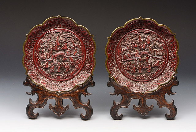 Appraisal: A PAIR OF CHINESE CINNABAR LACQUER LOTUS FLOWER DISHES each