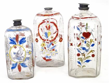 Appraisal: Three Stiegel type enameled uncolored glass perfume elixer bottlescirca