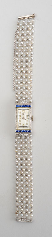 Appraisal: WHITE GOLD NATURAL PEARL SAPPHIRE AND DIAMOND WRISTWATCH The rectangular