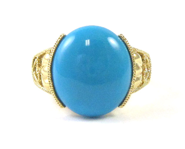 Appraisal: TURQUOISE AND TEN KARAT GOLD RING set with a single