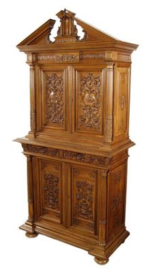 Appraisal: A French carved walnut buffet a deux corps in Renaissance