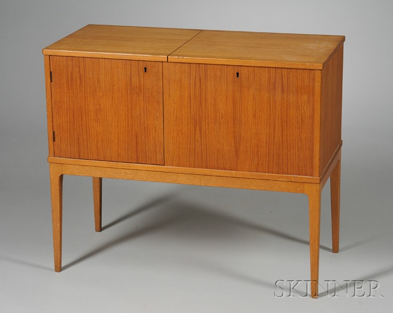 Appraisal: Scandinavian-style Office Cabinet Hardwood veneers Rectangular lift top compartment fitted