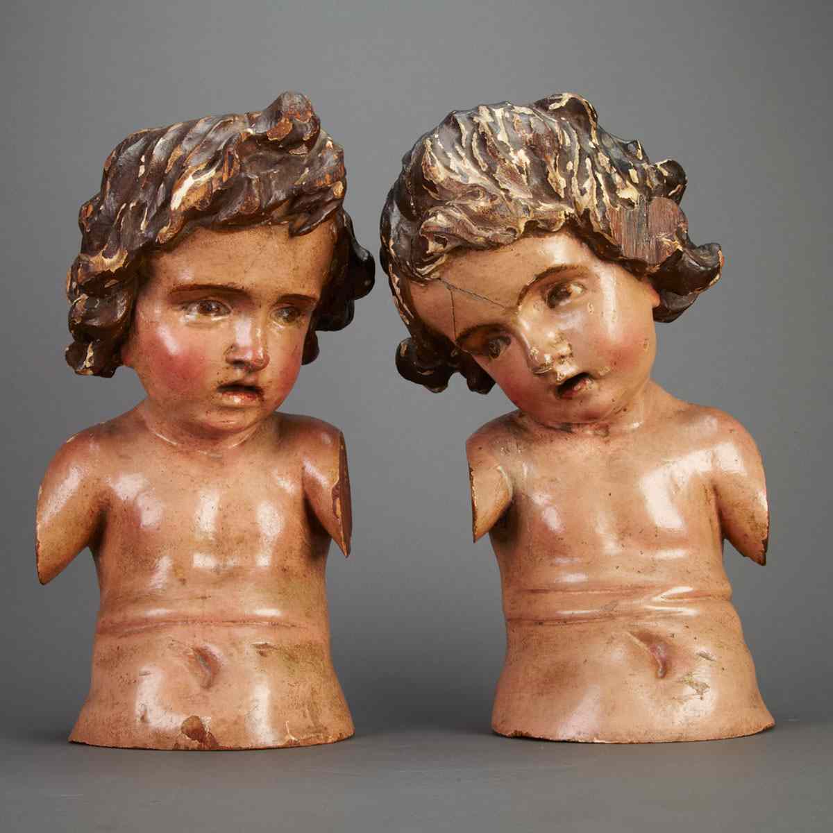 Appraisal: Pair of Italian Carved and Polychromed Cherub Form Architectural Fragments