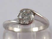 Appraisal: An carat white gold crossover diamond solitaire ring the round