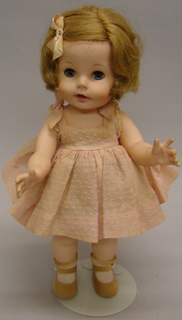 Appraisal: Vinyl - tagged Caroline All original doll dressed in pink