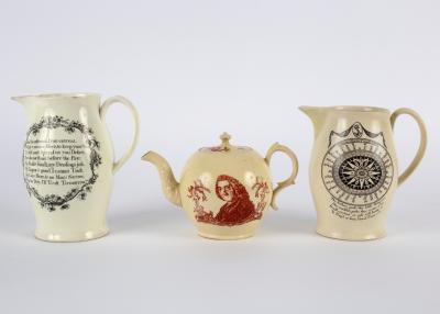 Appraisal: Two English creamware transfer printed jugs and a bullet-shaped teapot