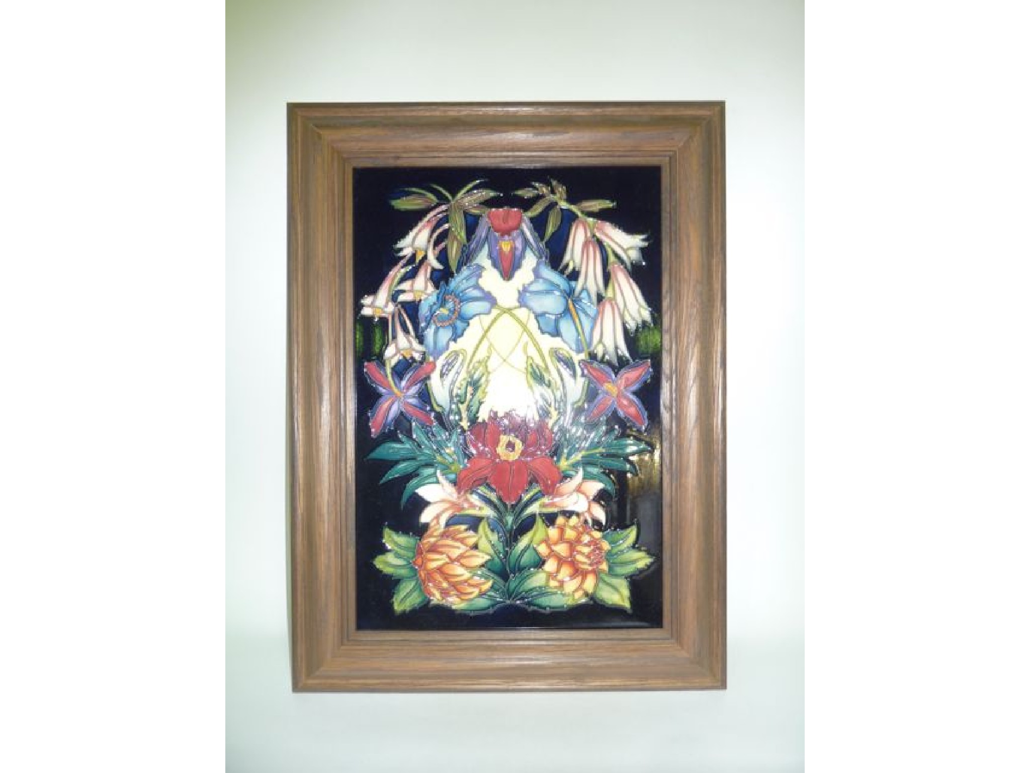 Appraisal: A Moorcroft limited edition tile of rectangular form designed by