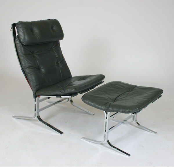 Appraisal: Danish Modern leather lounge chair with ottoman steel grey leather