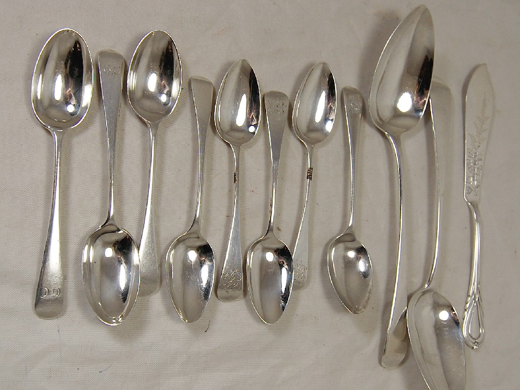 Appraisal: Two Old English serving spoons to w eight Old English