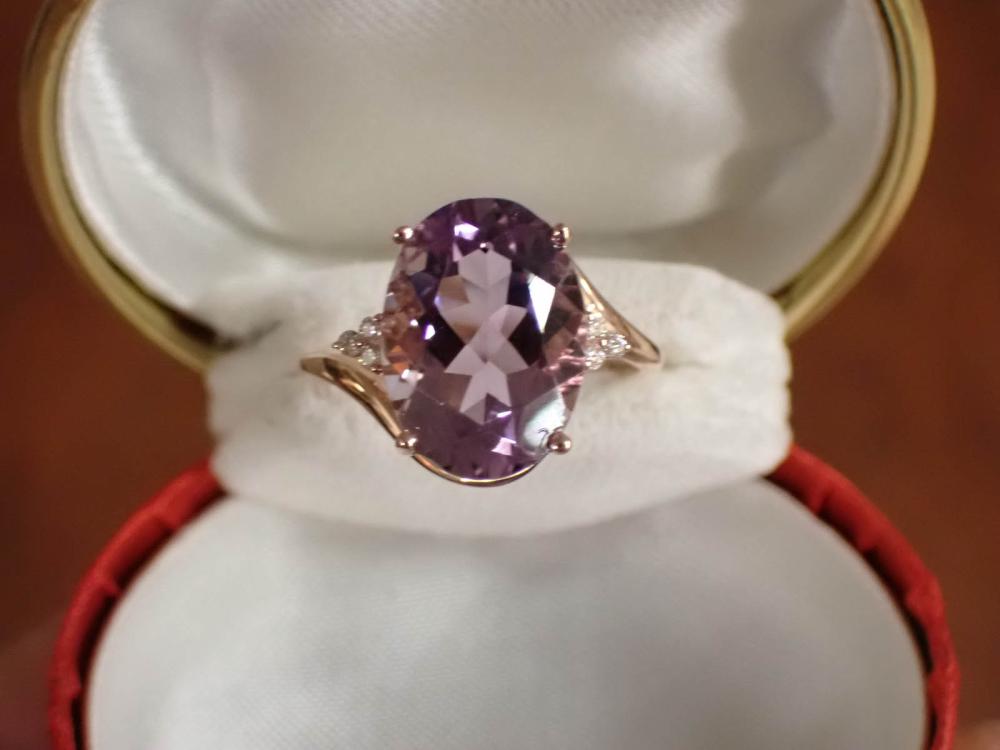 Appraisal: AMETHYST DIAMOND AND KARAT ROSE GOLD RING having three round-cut