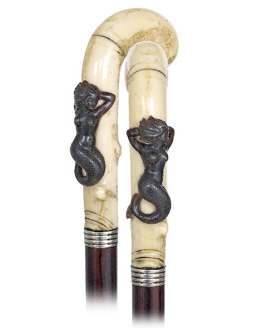 Appraisal: Walrus and Horn Mermaid Cane -Ca -Walrus pistol grip handle