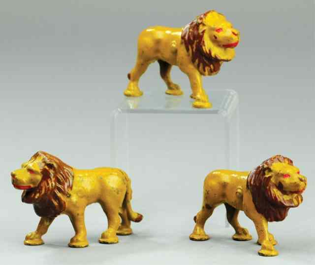 Appraisal: LOT OF THREE LION FIGURES Hubley cast iron each painted