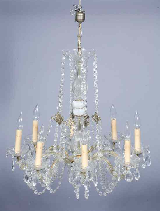 Appraisal: CUT GLASS EIGHT-LIGHT CHANDELIER Eight scrolling arms terminate in candle