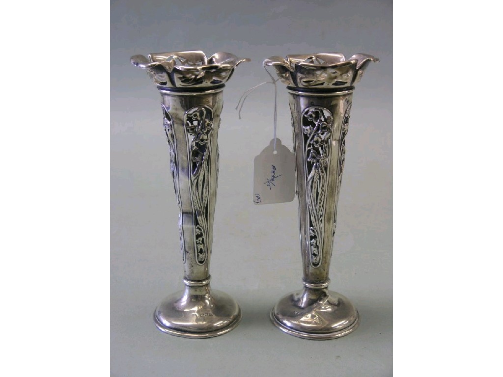 Appraisal: A pair of Art Nouveau silver vases pierced with stylised