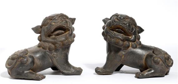 Appraisal: A PAIR OF IRON FO DOGS China height cm