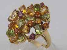 Appraisal: A yellow metal tests carat gold ''tutti frutti'' multi gem