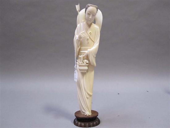 Appraisal: CHINESE CARVED IVORY FIGURE OF A ROBED WOMAN th C