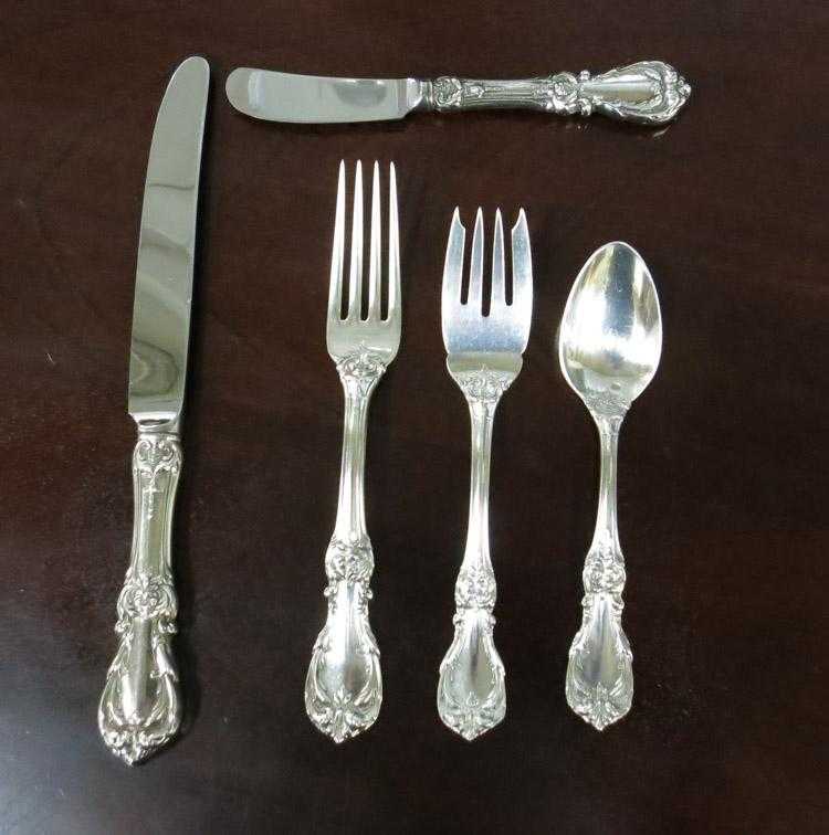 Appraisal: REED BARTON BURGUNDY STERLING SILVER FLATWARE SET sixty-two piece service