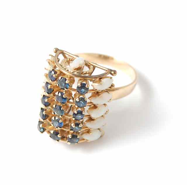 Appraisal: SAPPHIRE AND OPAL RING k yellow gold set with round-cut