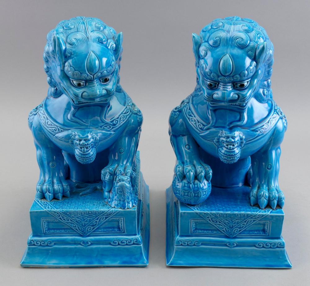 Appraisal: PAIR OF CHINESE TURQUOISE GLAZE PORCELAIN FOO DOGS EARLY TH