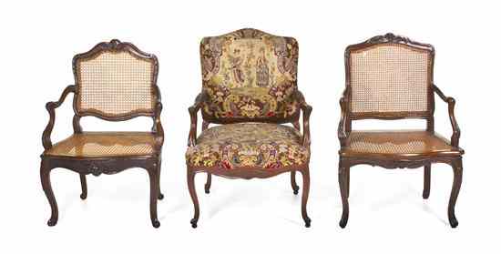 Appraisal: A Group of Three Louis XV Style Mahogany Fauteuils comprising