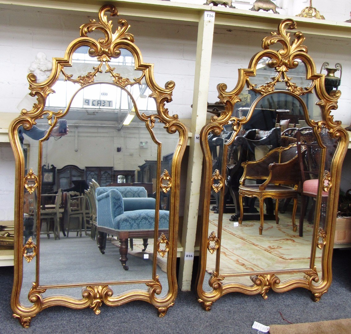 Appraisal: A pair of th century style gilt framed arch top