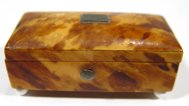 Appraisal: th Century rectangular tortoiseshell snuff box and cover on white