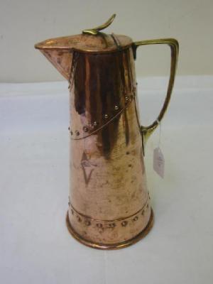 Appraisal: AN ARTS AND CRAFTS COPPER EWER of tapering form the