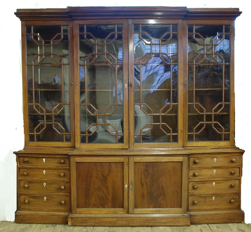 Appraisal: NINETEENTH CENTURY MAHOGANY BREAKFRONT LIBRARY BOOKCASE the moulded cornice above