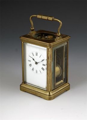 Appraisal: A French gilt brass corniche case carriage clock with a