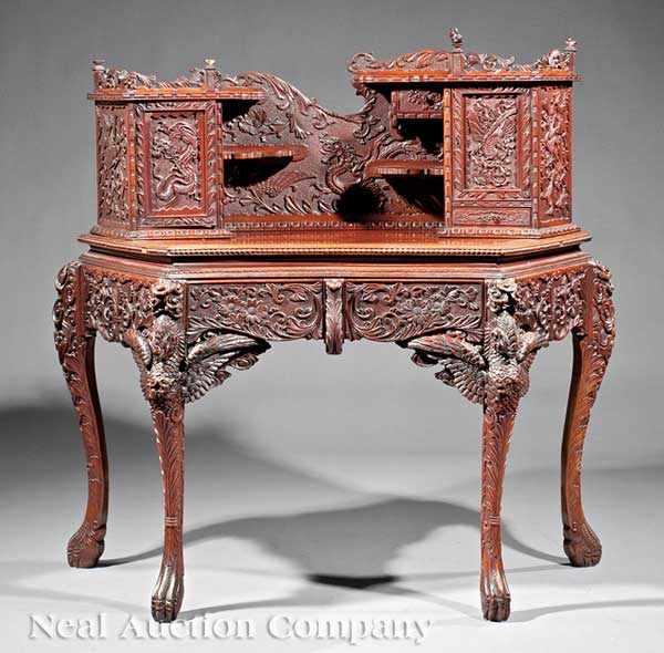 Appraisal: A Japanese Highly Carved Hardwood Writing Desk Meiji Period -