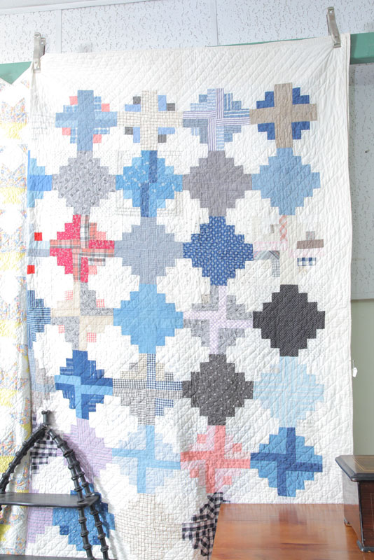 Appraisal: LOG CABIN CAPITOL STEPS QUILT White ground with a white