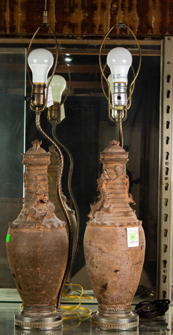 Appraisal: PAIR OF CHINESE FUNERAL POTTERY VASES MOUNTED AS LAMPS Pair