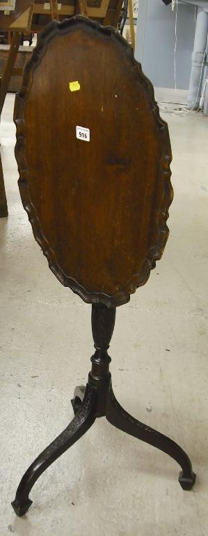 Appraisal: Mahogany tripod snap top occasional table the moulded oval tray