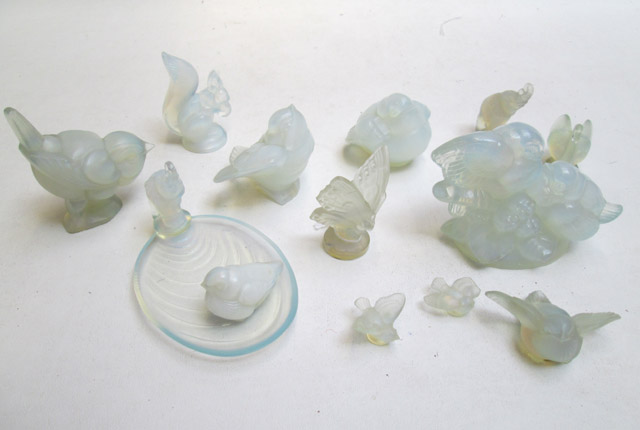 Appraisal: SABINO PARIS ART GLASS FIGURINES thirteen pieces of opalescent crystal