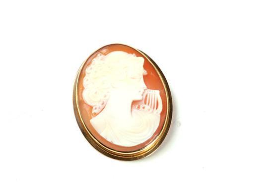 Appraisal: CAMEO BROOCH Classical profile of a woman with lyre In