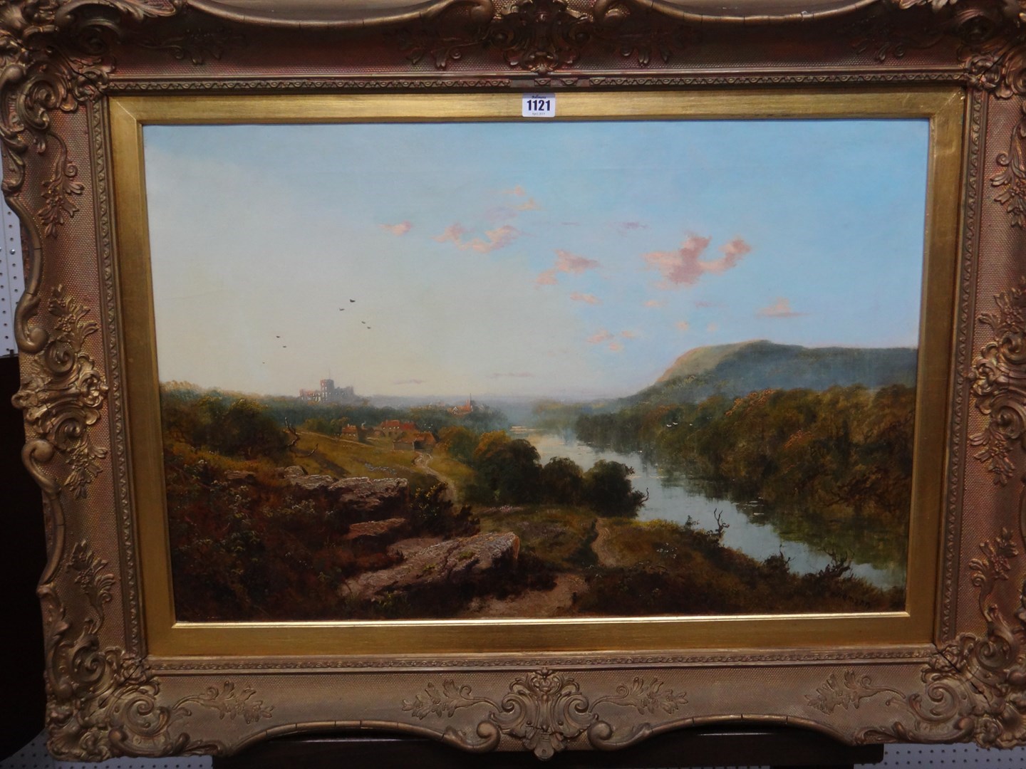 Appraisal: Edward H Niemann fl - Extensive river landscape with castle