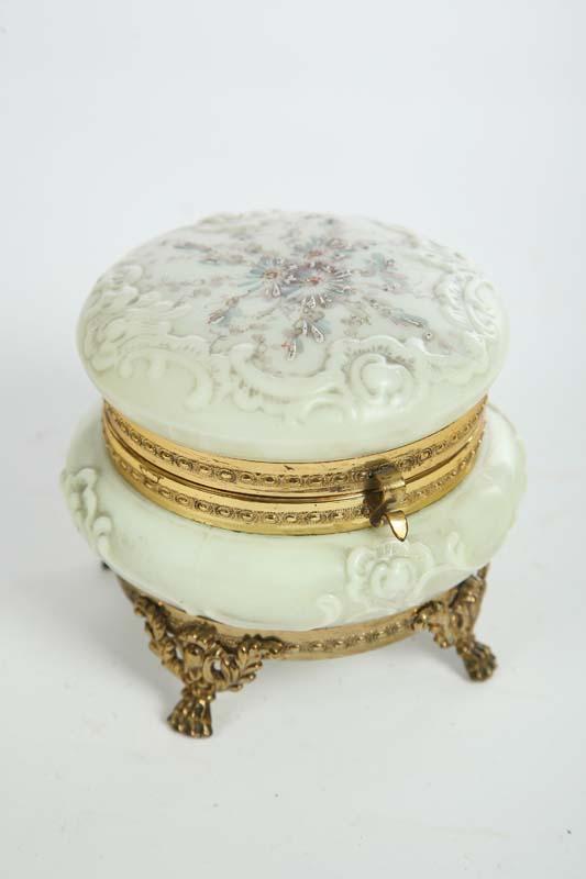 Appraisal: WAVECREST POWDER BOX White with enameled daisies and brass fittings