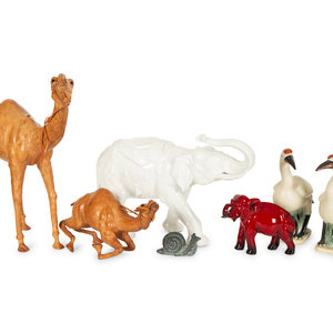 Appraisal: A Collection of Animal Figures comprising two porcelain elephants two