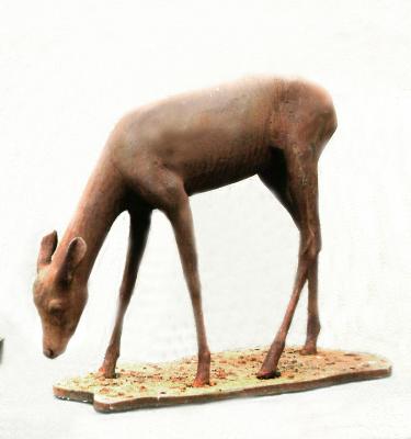 Appraisal: A CAST IRON FIGURE of a young deer th century